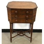 A Victorian mahogany and inlaid sewing table, octagonal top with two drawers, 45cm x 33cm x 72cm