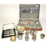 A 20th Century six person cased silver plated cutlery service with beaded pattern, together with