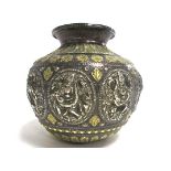 An Indian metalwork pot, having brass and silver colouring, with multiple cartouches of deities,