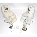Three blanc de chine oxen, height 6cm, a pair of Continental figures and two Staffordshire spaniels,