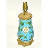 A 19th Century porcelain lamp base in the manner of Minton, on a bleu celeste ground with opposing