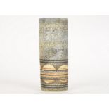 A Troika Pottery cylindrical vase, with a textured bisque blue brown ground and lower border of