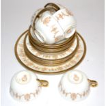 A Royal Albert part tea set, on a cream ground, decorated with neo-classical swags and urns and a