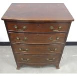 A late 19th Century mahogany bow fronted chest, of four long graduated drawers which are oak lined