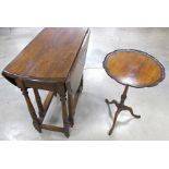 A 20th Century oval oak gate leg table, moulded top raised on turned supports, 40cm x 74 cm x