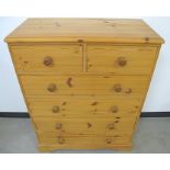 A contemporary Pine chest, of two short over three long drawers, moulded top, raised on a shaped