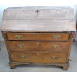 A Georgian oak farmhouse bureau, fitted interior, raised on bracket feet, 111cm x 54cm x 111cm