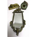 A 19th Century brass mirror with Satyrs heads, surmounted by a centaur and pipe player, with