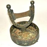 A cast iron boot scraper, of oval form, 28cm x 26cm