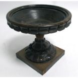A 19th Century treen rosewood circular centre bowl, with decorative carving, 20cm x 22cm,