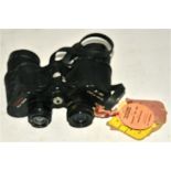 A pair of Gemini binoculars with racing cards attached, including 'Newmarket', 'Leicester' and '