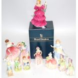 A small collection of Royal Doulton figures of women and children, to include Musical Moments, two