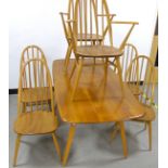 A Mid- Century blonde Ercol dining set, comprising of four side and two caver Quaker Windsor