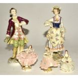 A pair of 19th Century Naples Capodimonte figures, in 18th Century attire, one male one female,