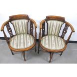 A pair of early 20th Century stained beech corner chairs, with boxwood stringing, central padded