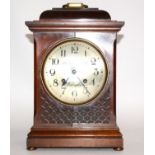 A Regency mahogany eight day movement bracket clock, from Robert E. Hogben, the silvered round