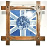 A Delft pottery blue and white tile, for the 1953 coronation of Queen Elizabeth II, framed, internal