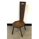 A Victorian oak hall chair, with branch and acorn moulded design and having shield to seat