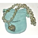 A Tiffany and Co 925 silver chain link necklace, the heart pendant marked 'Please return to