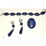 A lapis lazuli set, consisting of bracelet, brooch and 925 earrings, (3)