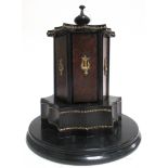 A 20th Century ebonised metal mounted cigar humidor, of six sections, with lyre ornamentation,