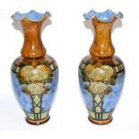 A pair of Royal Doulton vases, with flaring everted rims, decorated with fruits, with inscribed
