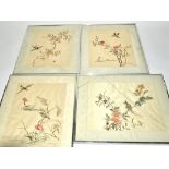 Four 20th Century Chinese silks with birds amidst flowers, each framed but some without glaze,