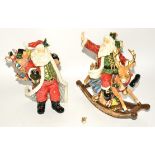 Two late 20th Century ceramic Christmas figures, one with Father Christmas on a rocking horse