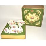 A Royal Crown Derby china tea set for two in original box, in the Posie pattern, with teapot, two