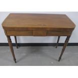 A Regency mahogany card table, rosewood cross banding with boxwood and ebony stringing, fold over