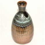 Paul Barron (British 1917-1983), a stoneware vase of ovoid form with splayed tapered neck, temoku