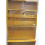 A mid- Century Simplex light oak six tier sectional bookcase, six various size sections, two