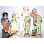 A small quantity of plaster figures of angels and children, mostly in white, the tallest a boy