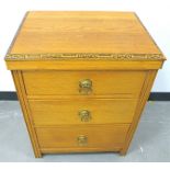 A 20th Century light oak chest, three graduated drawers 59cm x 44cm x 75cm