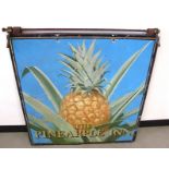 A vintage double sided pub sign, The Pineapple Inn, with image of the fruit on metal panel, metal