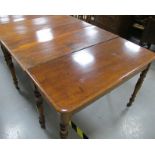 Two antique mahogany rectangular end tables, the tops having rounded corners and a moulded edge,