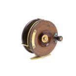 A vintage wooden and brass Starback fishing reel by C. Farlow & Co, the 5" reel with brass plaque