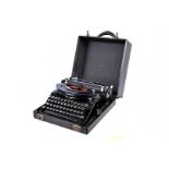 A Smith Premier Noiseless typewriter, in carry case