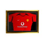 Manchester United, a framed and glazed replica shirt (Vodafone) signed Roy Keane, with Captain
