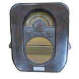 A bakelite radio receiver, Ekco type ACT 96 Transportable receiver, with 1936 presentation label