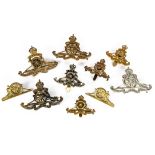 A group of Artillery cap badges, various ages, including Warwickshire Royal Horse Artillery (