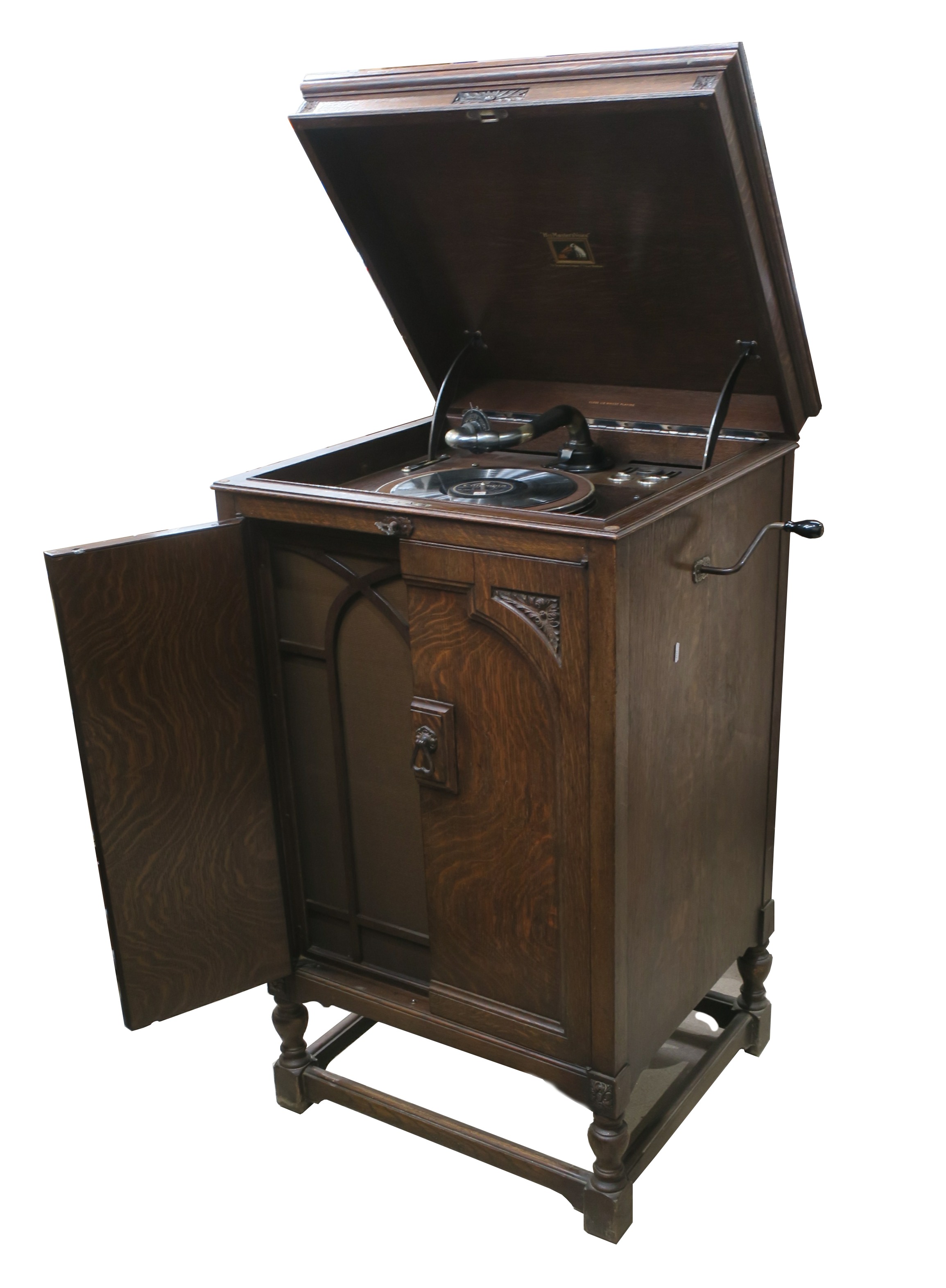 A cabinet gramophone, HMV Model 193, No. 1930000102, in oak case with lid key, with oil-bath