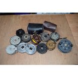 A collection of vintage fishing reels, comprising an unnamed brass example, Ambassadeur Abu, The