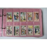 An album of overseas cards, mainly part sets, to include 32/37 BAT Railway Nautch Girl, Nanyang