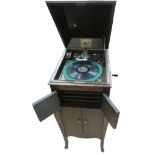 A cabinet gramophone, HMV Model 10, in oak case, with HMV Exhibition soundbox on gooseneck tone-