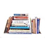 An assortment of various military/war related books, comprising Churchill by Ashley Jackson,