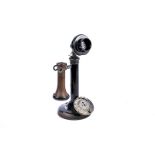 A telephone, a black candlestick type with oxidised fittings, marked PL30, 234 and No. 150, with