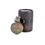 A US Vietnam era M67 Baseball grenade, marked 'Grenade, Hand, Frag, Delay,M67 5-73, COMP B, LOT LS-