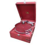 A portable gramophone, HMV Model 97 in red case with No. 21 soundbox, record tray and lid key,