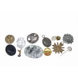 An assortment of various items, including a 2/Infanterie Ersatz Battalion 400 dog tag, black wound